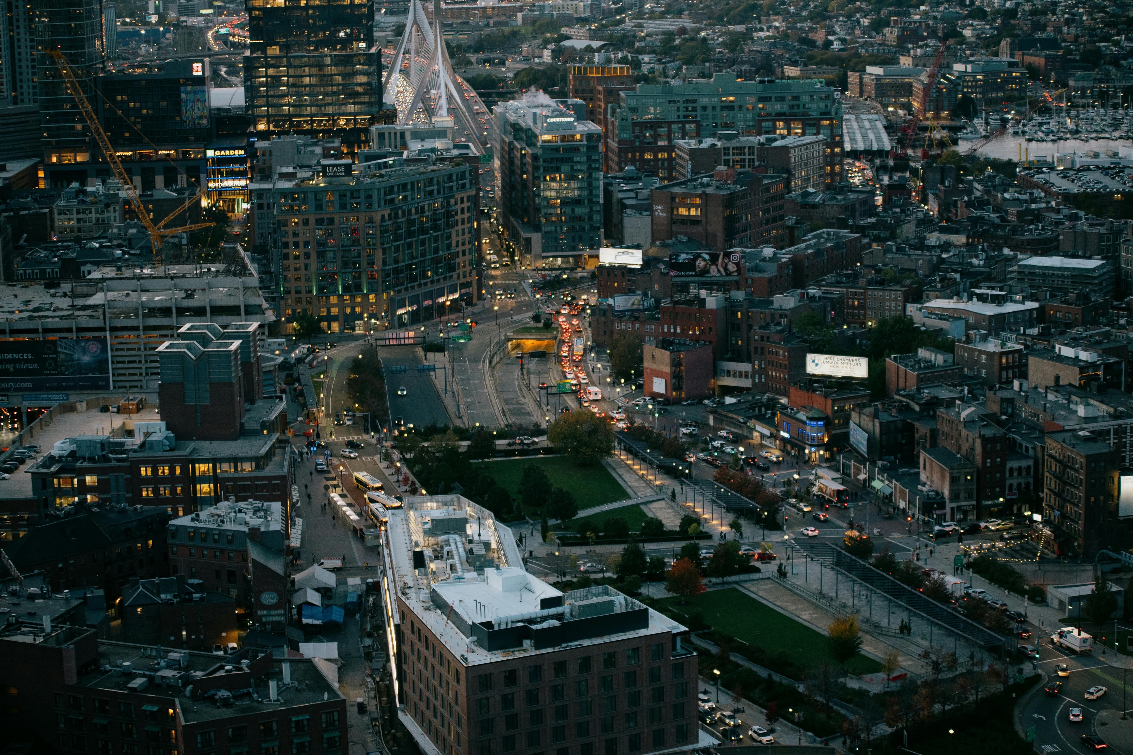 Twilight aerial view of Boston with the Rose Kennedy Greenway.